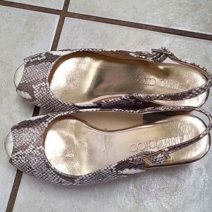 Jimmy Choos size 5 1/2. Color white snake
